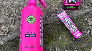 Close up detail of the Muc-Off Bottle for Life showing its Green credential claims