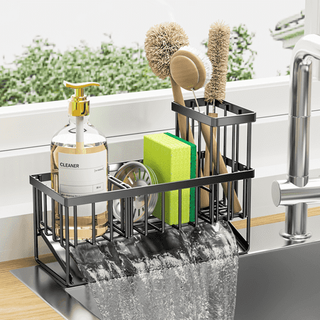 A black metal sink storage caddy for sponges and brushes