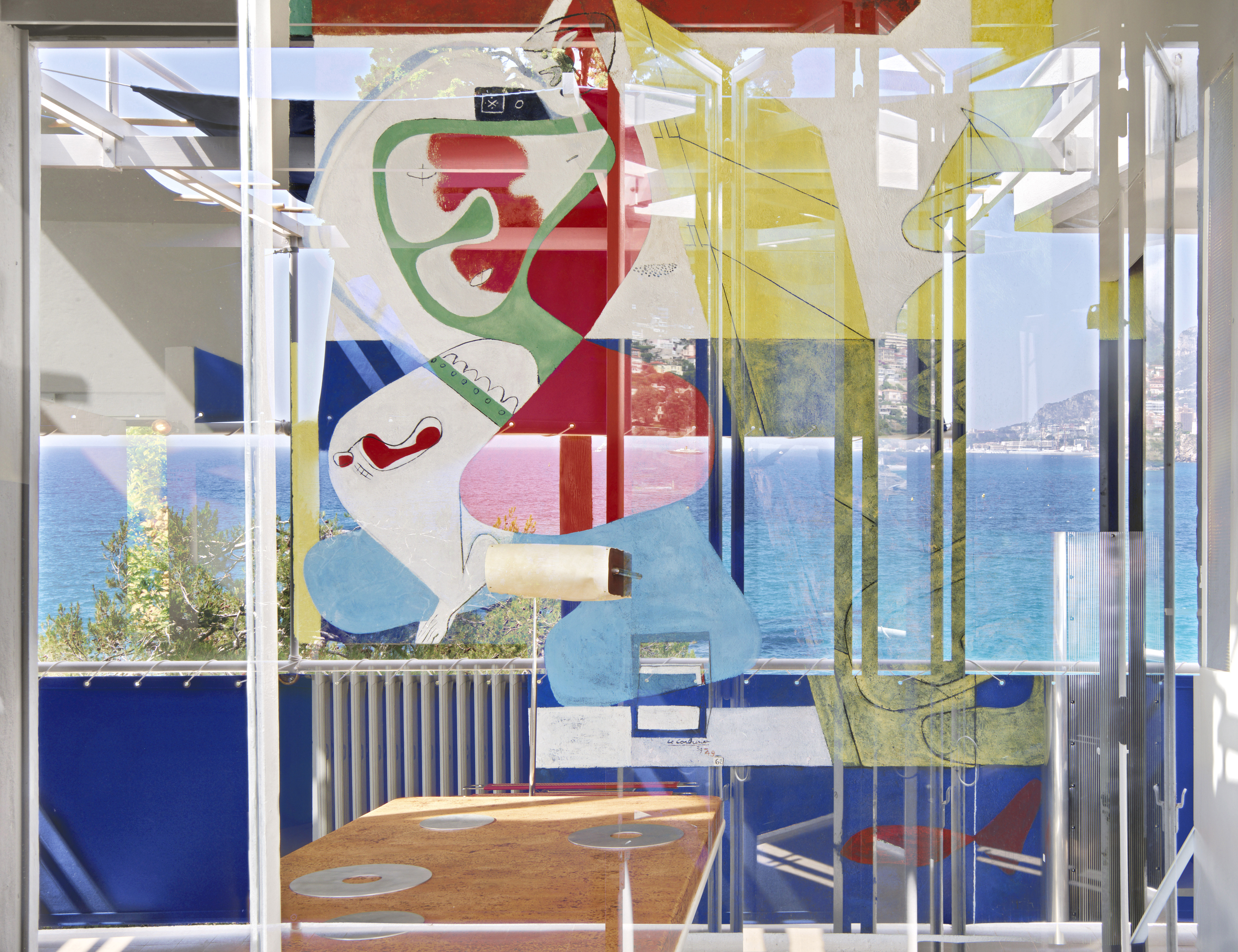 Eileen Gray furniture on view in Arles against a colourful backdrop