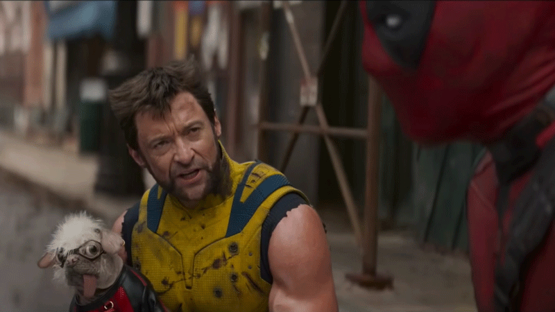 Clip of Peggy, winner of UK's Ugliest Dog photo contest, being held by Wolverine while Deadpool looks on, in 'Deadpool & Wolverine'