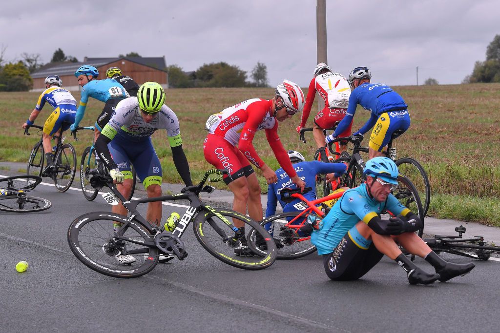 GERAARDSBERGEN BELGIUM OCTOBER 03 Dmitriy Gruzdev of Kazahkstan and Astana Pro Team Sven Erik Bystrom of Norway and UAE Team Emirates Emmanuel Morin of France and Team Cofidis Solutions Credits Peloton Crash Injury during the 16th BinckBank Tour 2020 Stage 5 a 1836km stage from Ottignies Louvain la Neuve to Muur van Geraardsbergen 108m BinckBankTour BinckBankTour on October 03 2020 in Geraardsbergen Belgium Photo by Luc ClaessenGetty Images