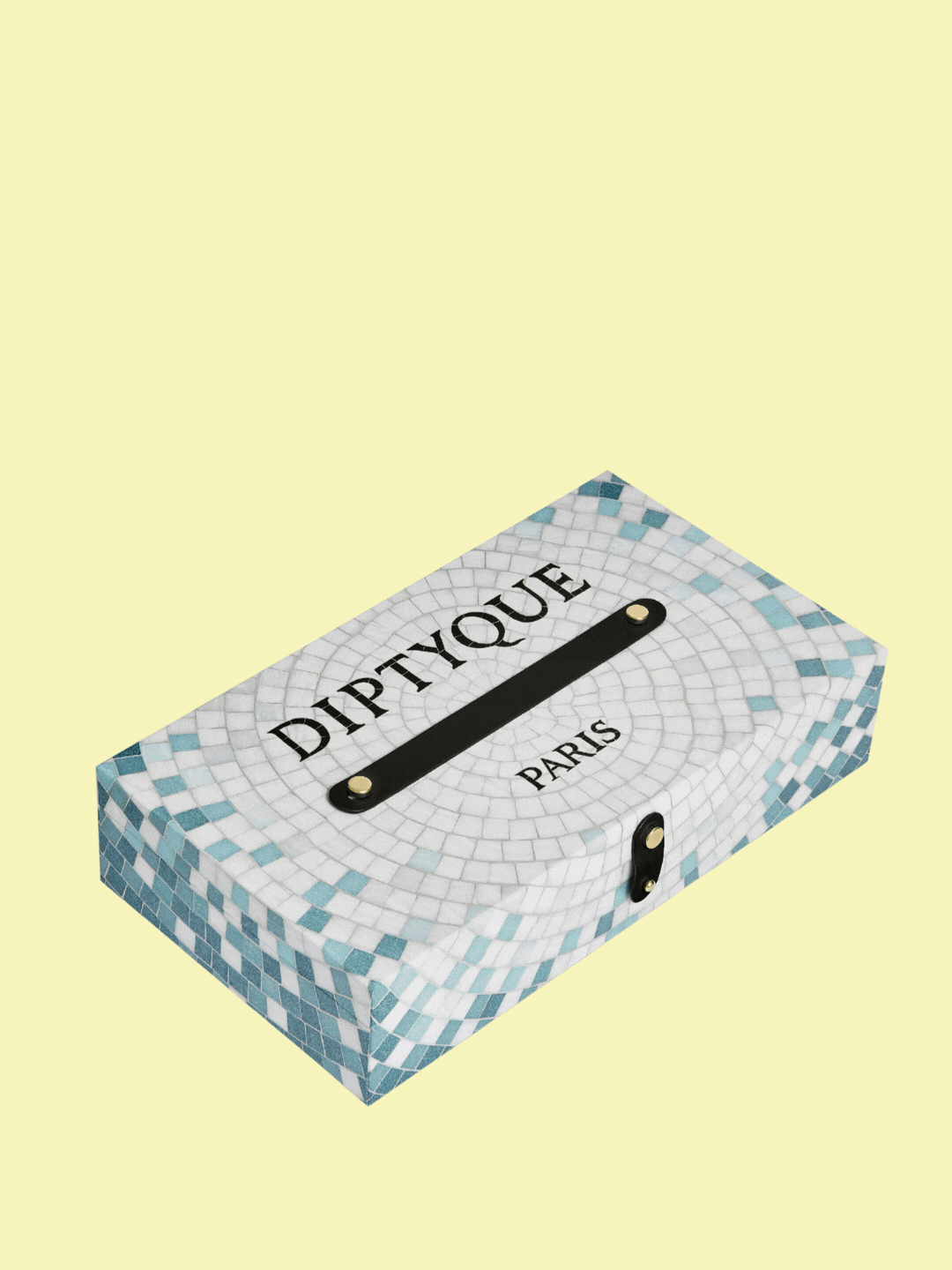 A tile-patterned box with a summer advent calendar from Diptyque opening up to reveal three candles, two lotions, one body oil, a perfume, a solid perfume, a hair spray, and a cleanser