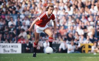 Sammy McIlroy in action for Manchester United against Tottenham in September 1980.