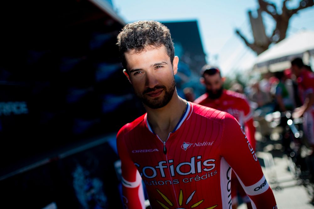 Cofidis' French rider Nacer Bouhanni walks to sign before the first stage of the 97th Volta Catalunya