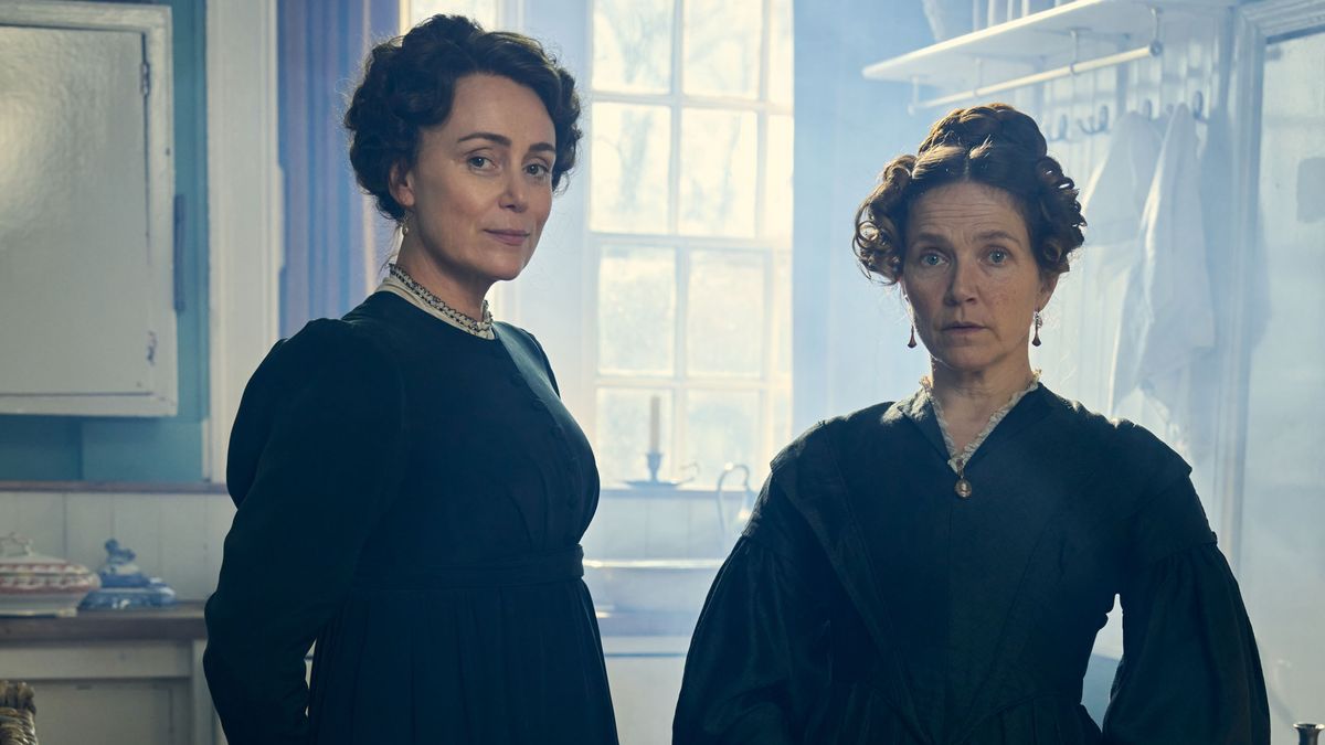 Keeley Hawes and Jessica Hynes in dark dresses as Cassandra and Mary Austen in Miss Austen.