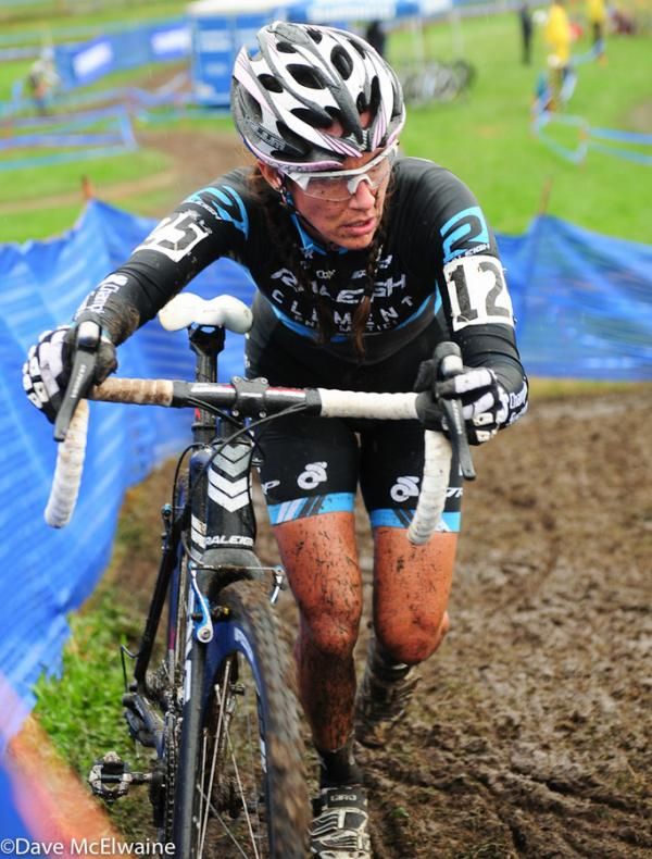 Nicole Duke (Raleigh Clement) running with her bike