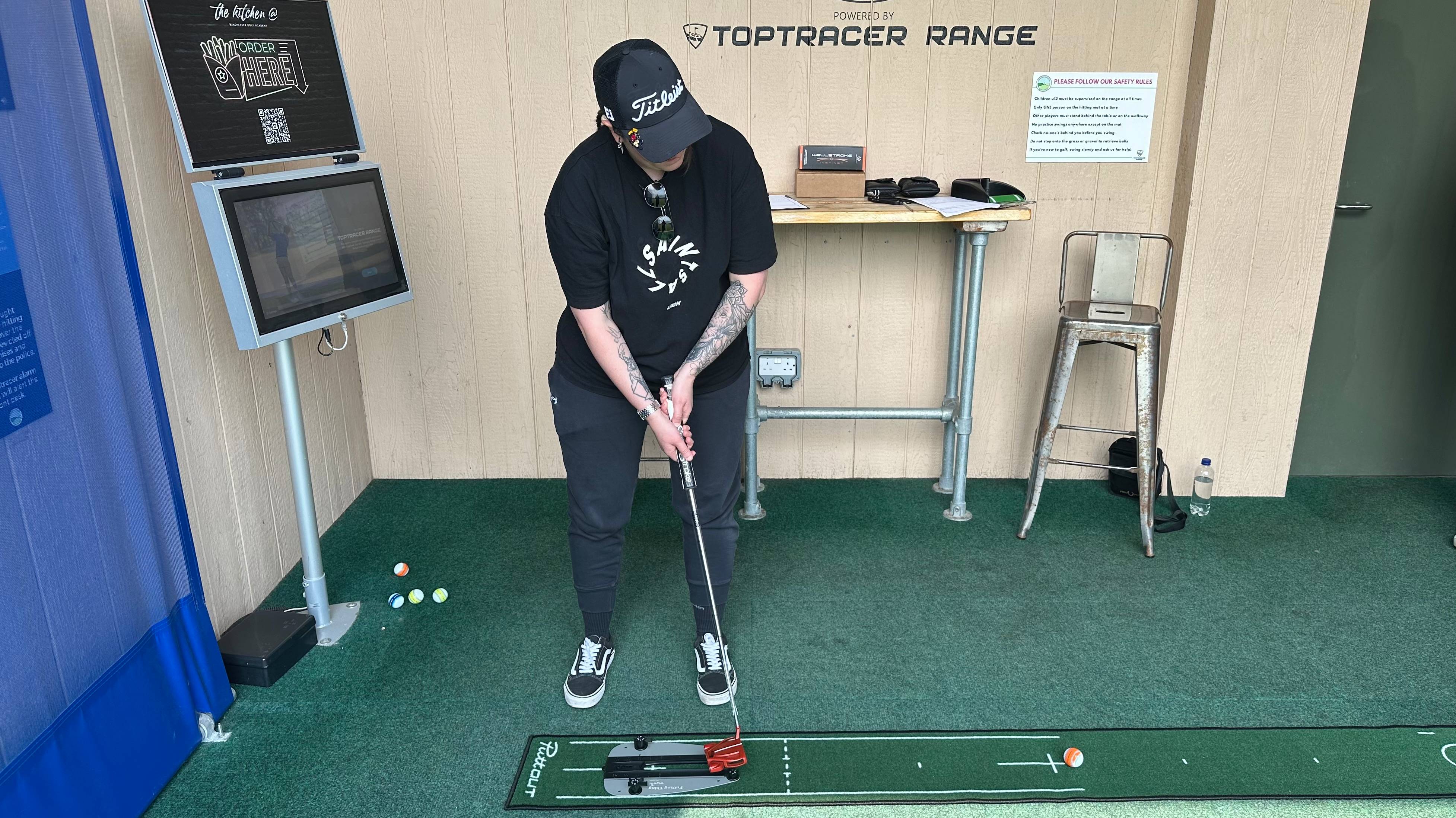 Golfer tests the Why Golf Putting Thing