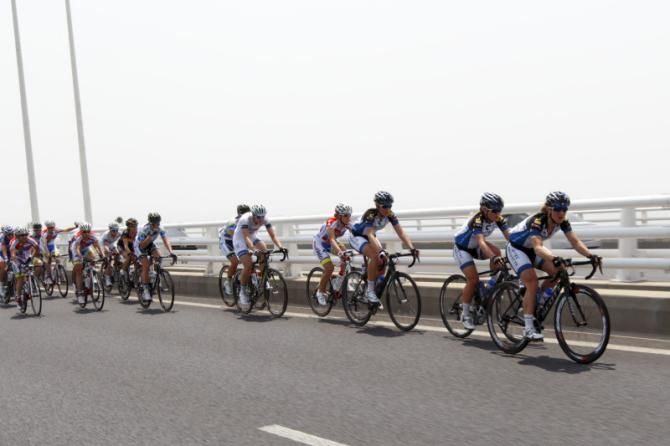 Cecilie Johnsen, Emilie Moberg and Thea Thorsen (Hitec Products) lead on the Yangtze River bridge