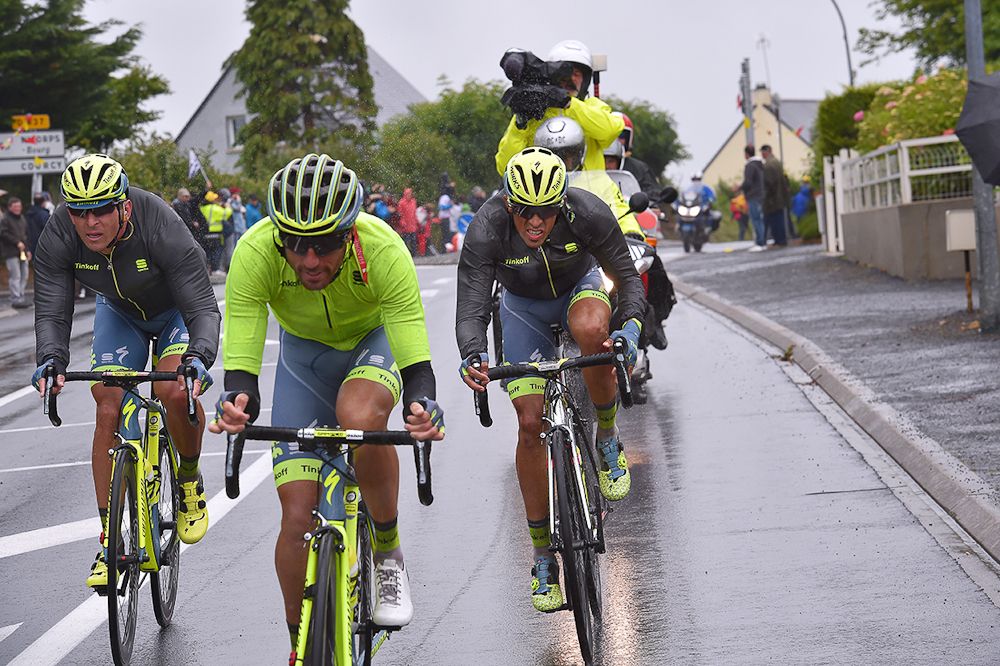 Tinkoff riders pace Alberto Contador back to the peloton during stage 2
