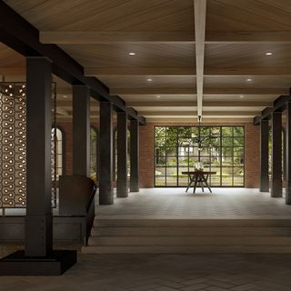 lobby with wooden table and beams