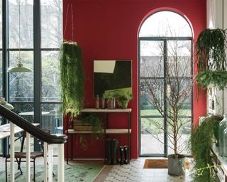 Red hallway design by Farrow & Ball using shades Rectory Red and Wimborne White