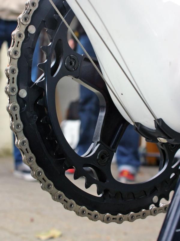 Aggressive milling of the backside of the chainring spider helps shave off a few grams.