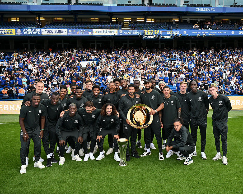 Chelsea show off the Club World Cup trophy at Stamford Bridge