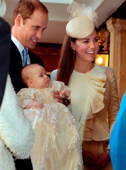 Prince William, Duchess of Cambridge and Prince George photo