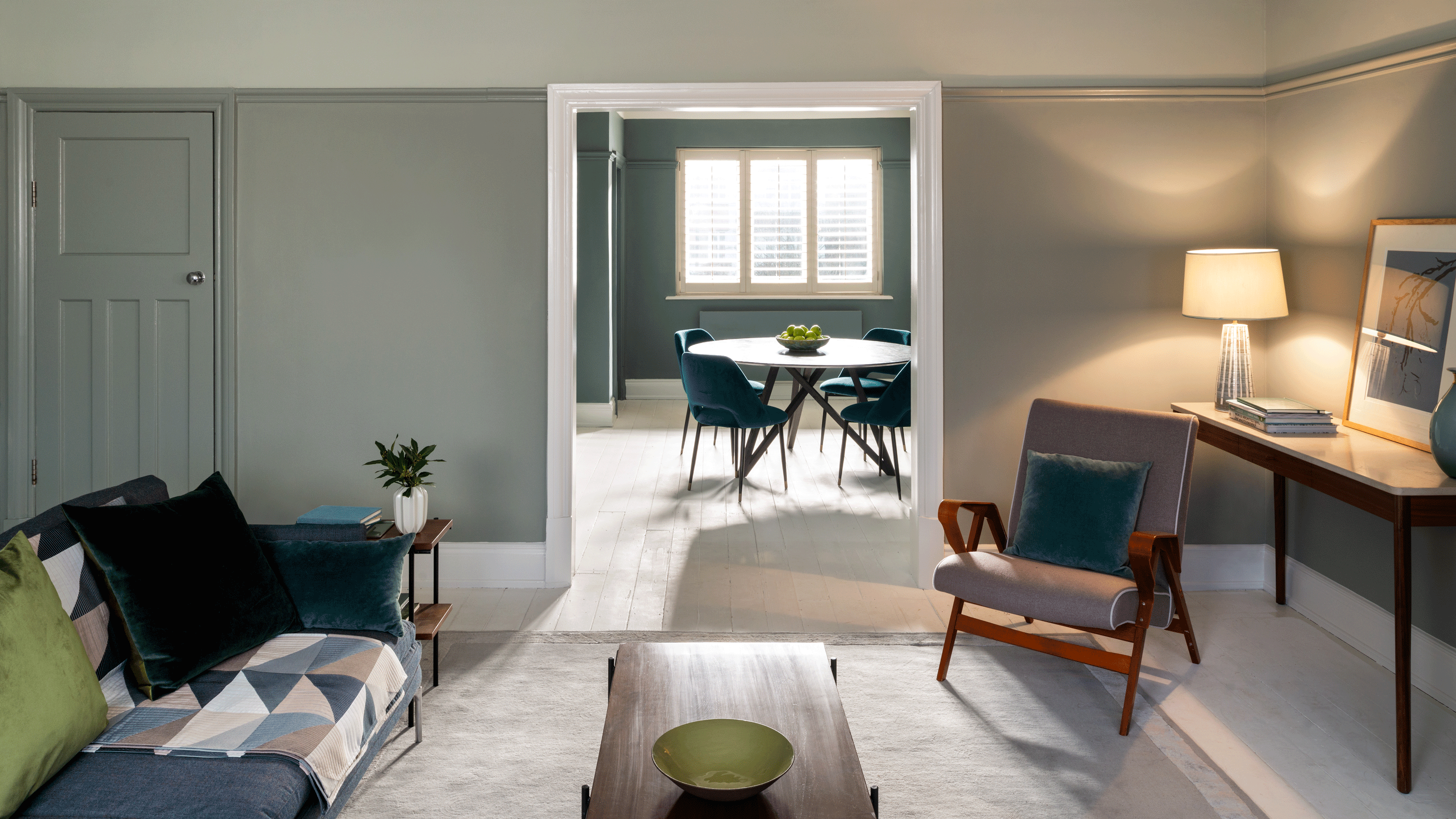 Blue-grey living room painted Pigeon by Farrow & Ball