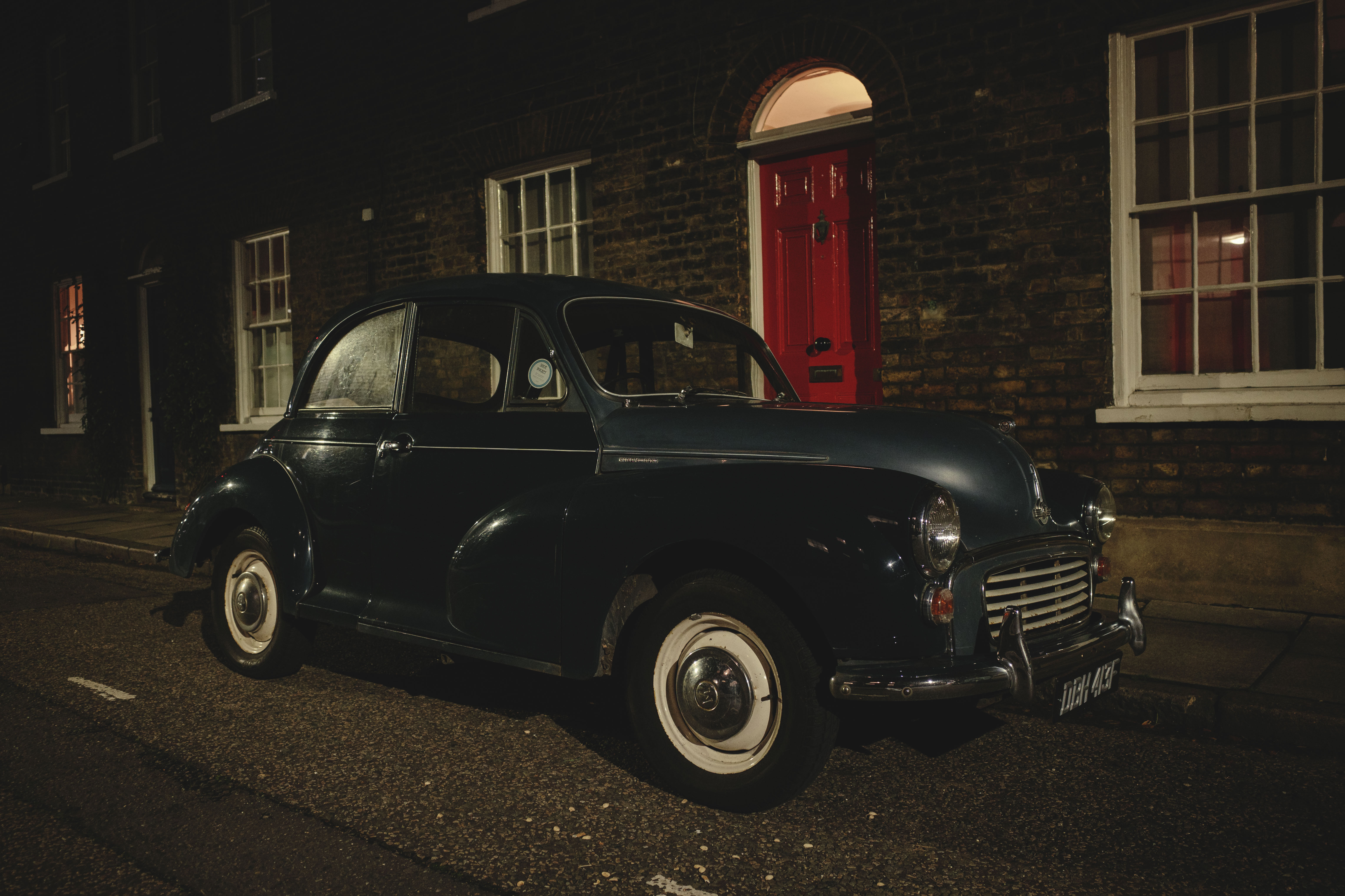 Ricoh GR IV sample images - classic car parked up in front of victorian houses in London at night