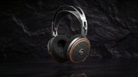 FiiO FT15 wired planar magnetic headphones in black walnut on a black background 