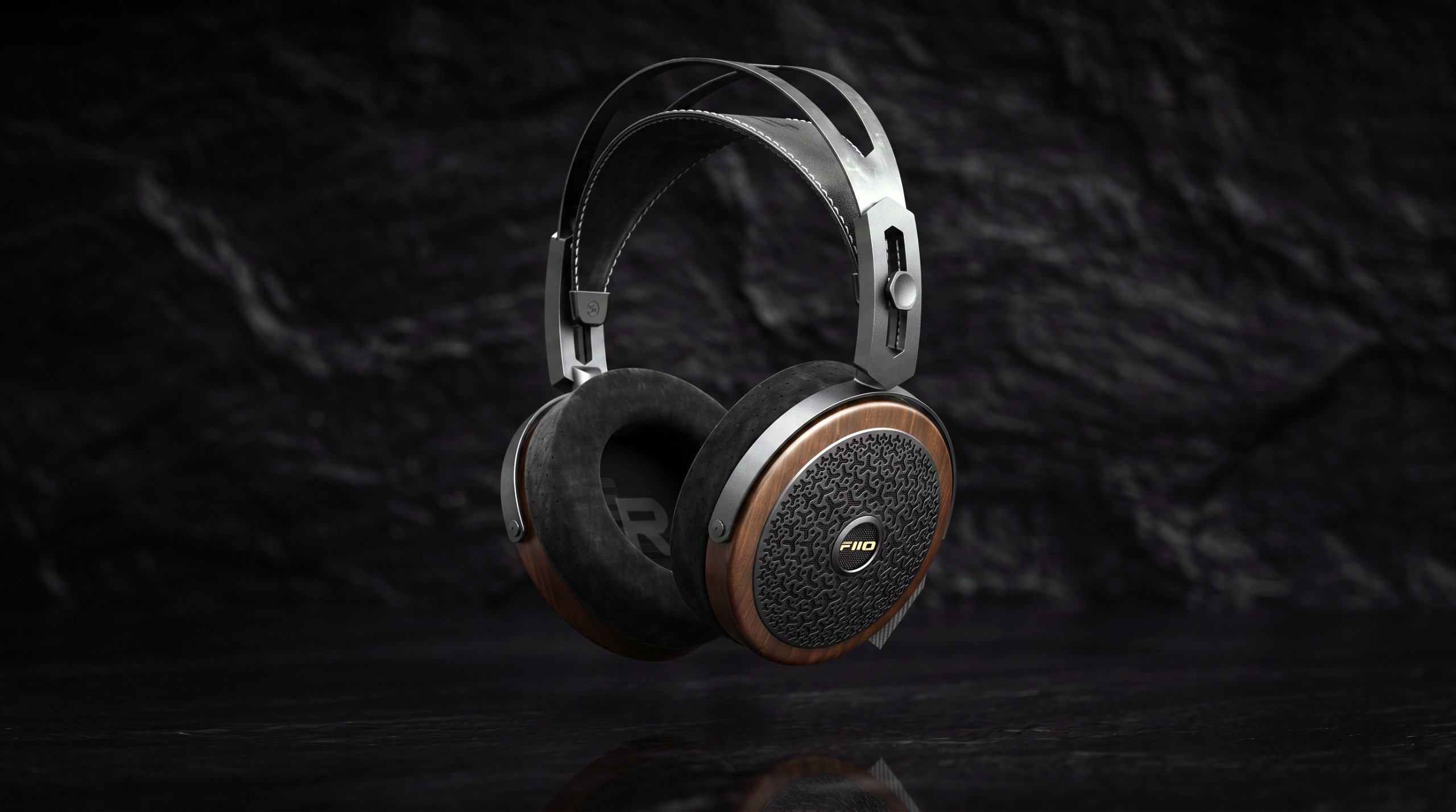 FiiO FT15 wired planar magnetic headphones in black walnut on a black background 