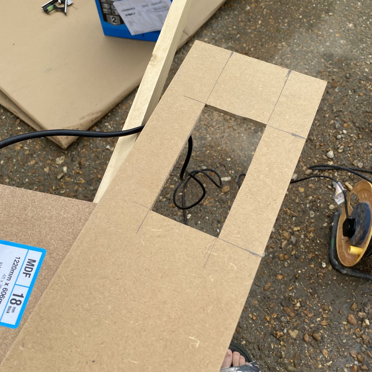 Cutting a plug hole in wall panelling