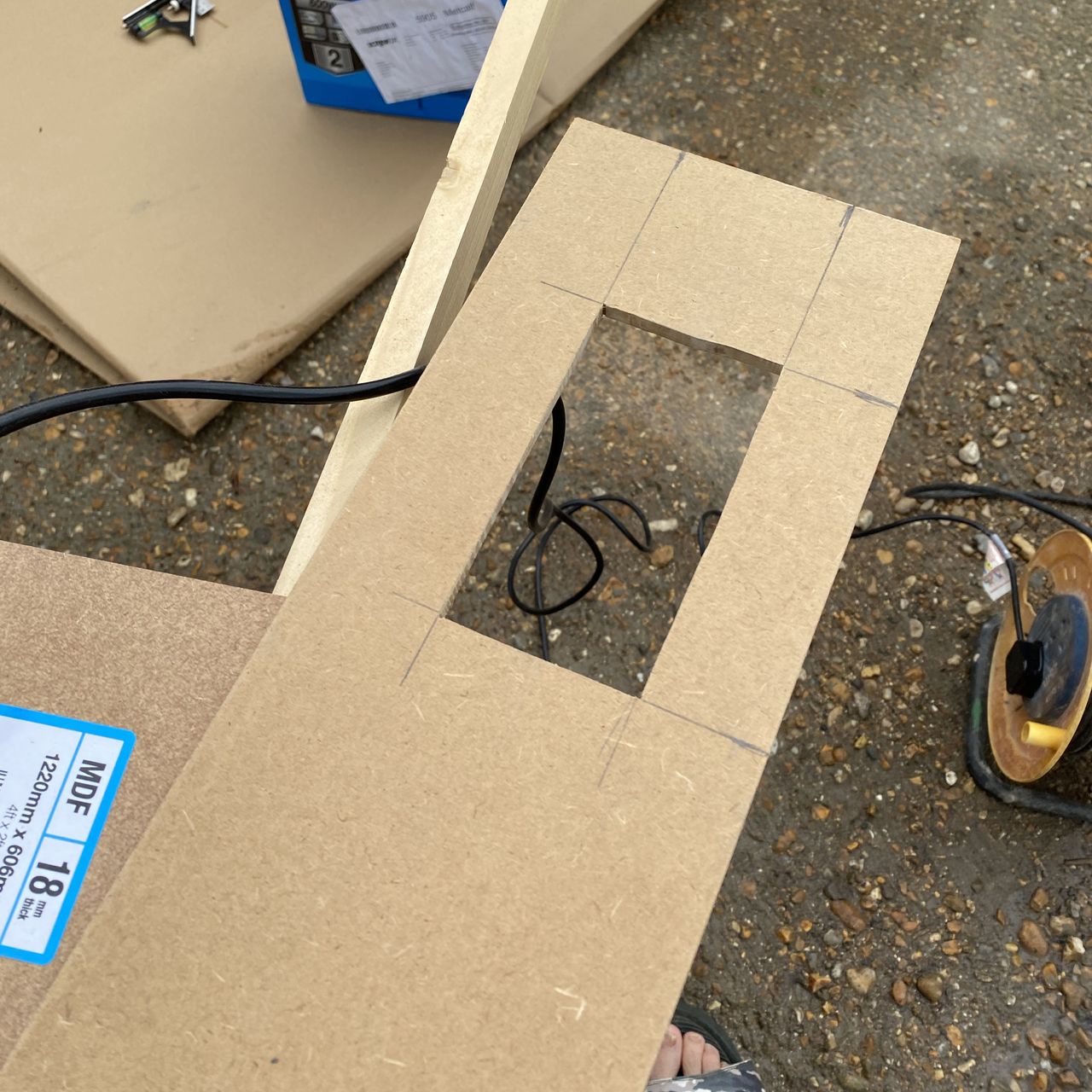 Cutting a plug hole in wall panelling