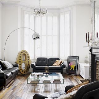 living room with white wall and sofa