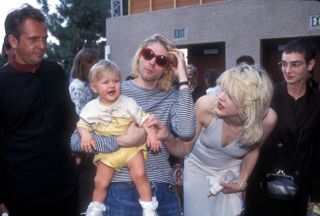 Peter Gabriel, Kurt Cobain of Nirvana with wife Courtney Love and daughter Frances Bean Cobain, and Sinead O'Connor.