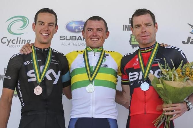The 2014 Men's road race podium, Richie Porte (Team Sky), Simon Gerrans (Orica-GreenEdge) and Cadel Evans (BMC)