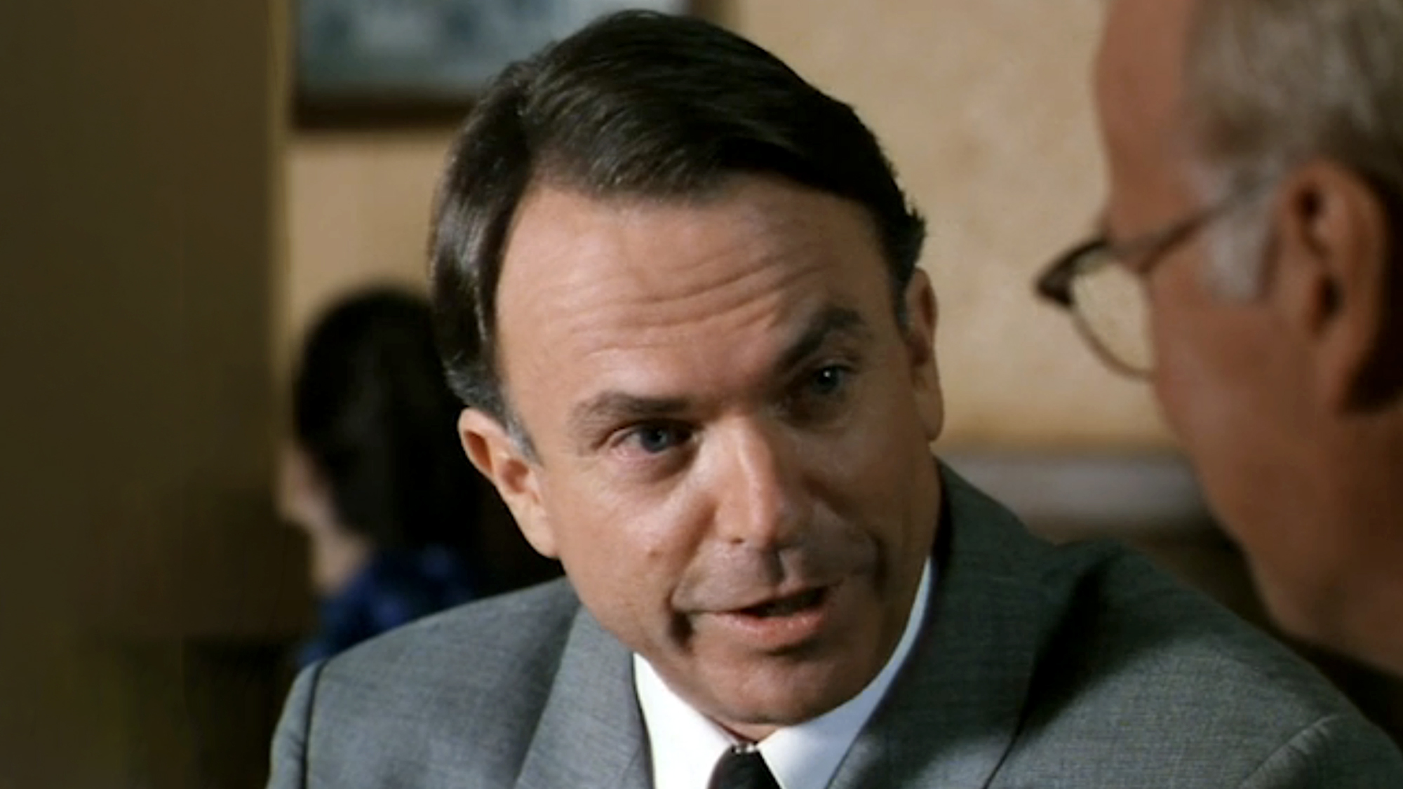 Sam Neill as Alvin Dewey in the 1996 miniseries adaptation In Coold Blood.