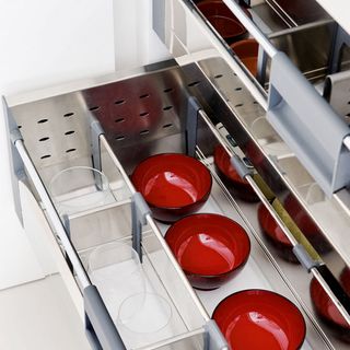 kitchen with crockery drawer and kitchen utensils
