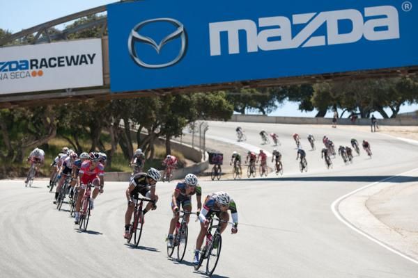 Team Exergy leads the men's field down the infamous corkscrew section of the Laguna Seca raceway as race leader Andy Jacques-Maynes (Kenda-5 Hour Energy) is left behind with a mechanical