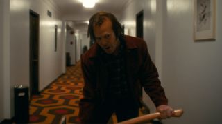 Henry Thomas as Jack Torrance with axe in Doctor Sleep