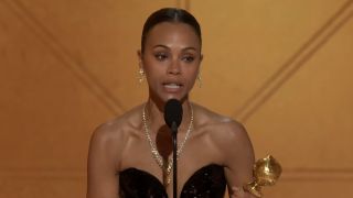 Zoe Saldaña giving speech at Golden Globes