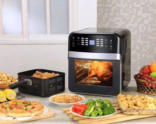 New modern ai high technology luxury beautiful electronic product design air fryer black square machine for bake cook fried skew on white background for house kitchen and restaurant