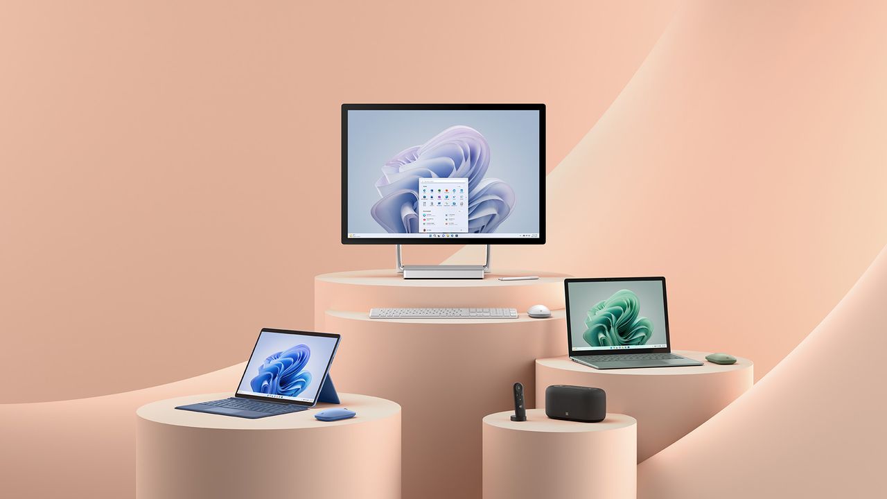 The new Microsoft Surface family presented against a salmon backdrop