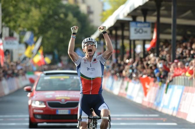 Rui Costa (Portugal) celebrates winning the elite men's road world championship in Florence, Italy