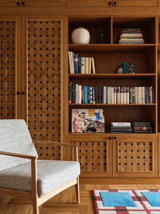 A living room with a built-in TV unit