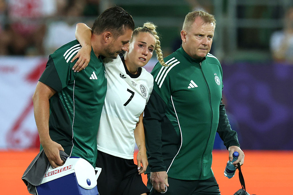 Giulia Gwinn of Germany reacts, as she leaves the pitch with a injury during the UEFA Women's EURO 2025 Group C match between Germany and Poland at Arena St. Gallen on July 04, 2025 in St Gallen, Switzerland.