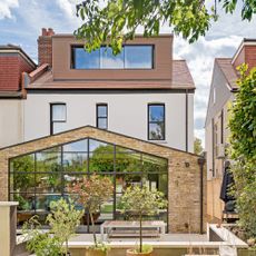 exterior of a house with extension with crittall patio doors