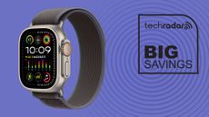 Apple Watch Ultra 2 with blue and black trail loop band on purple background with black TechRadar big savings icon