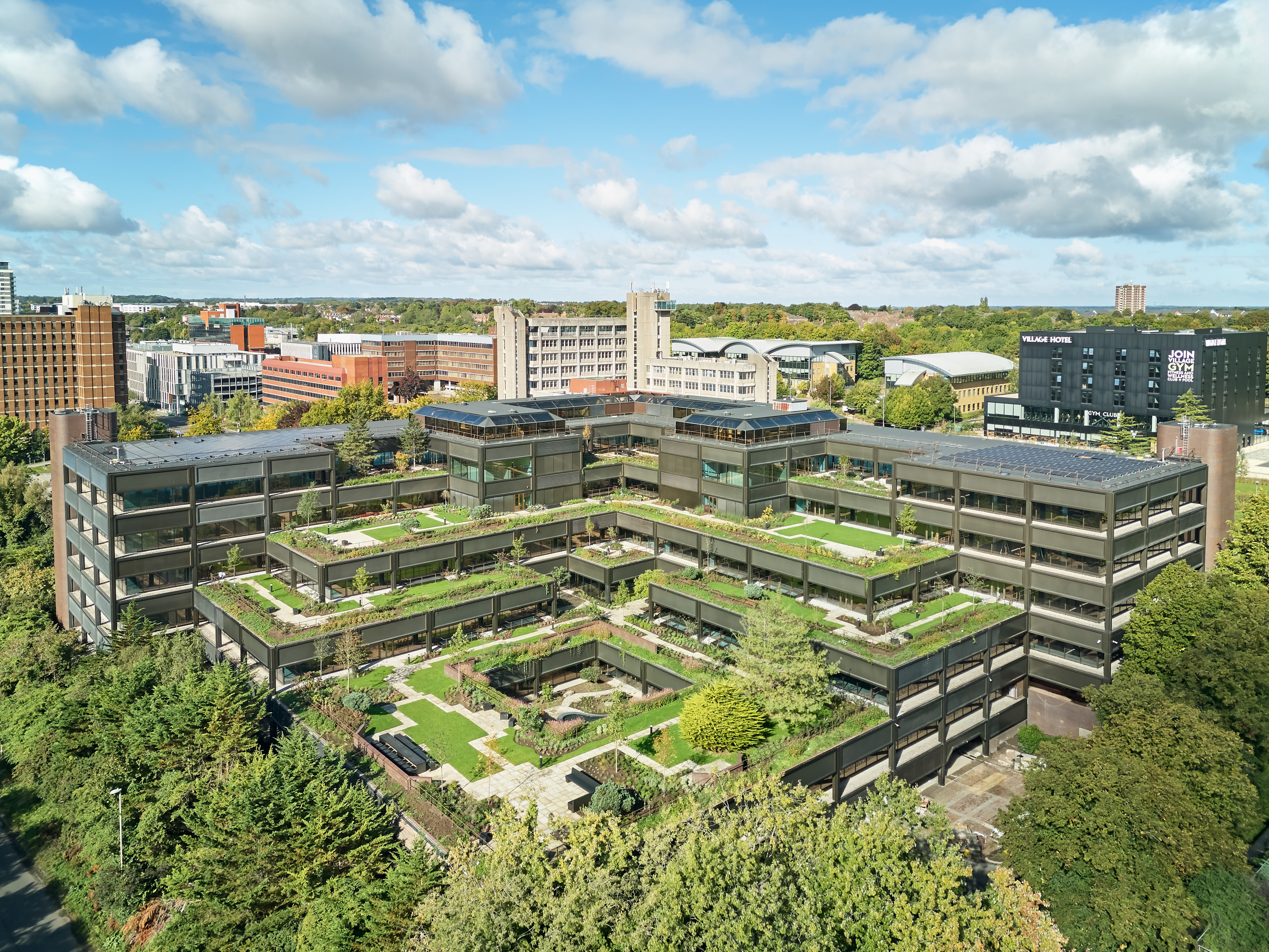 Plant by Knight Stokoe, a brutalist garden revived in basingstoke featuring cascading planted terraces