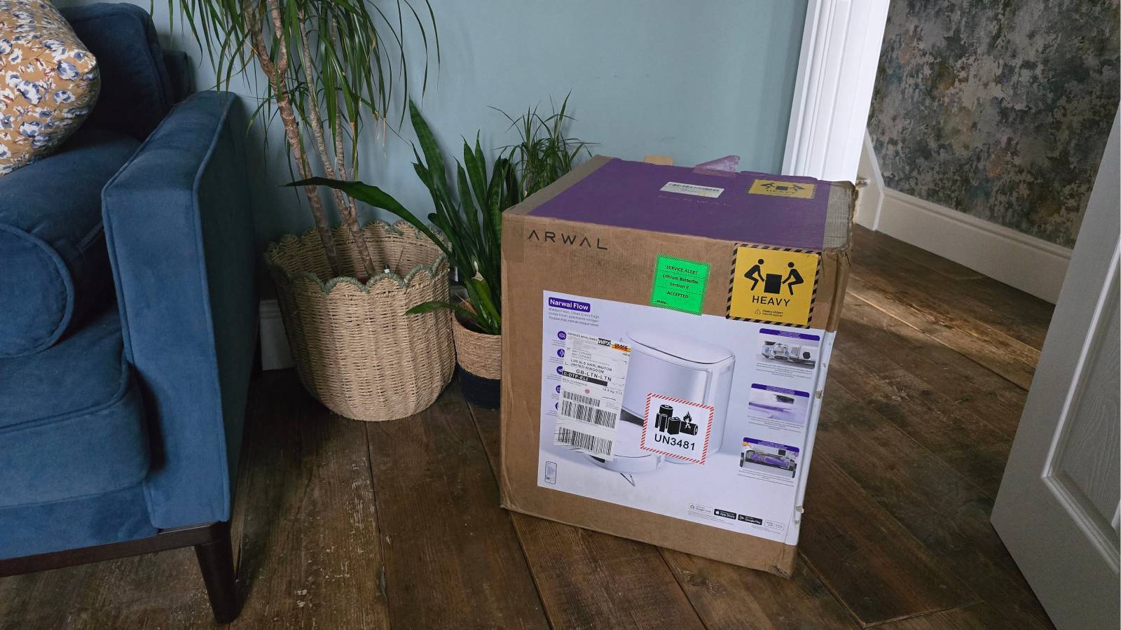 Narwal Flow Robot Vacuum &amp;amp; Mop in box in living room