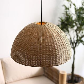 A rounded rattan light fixture