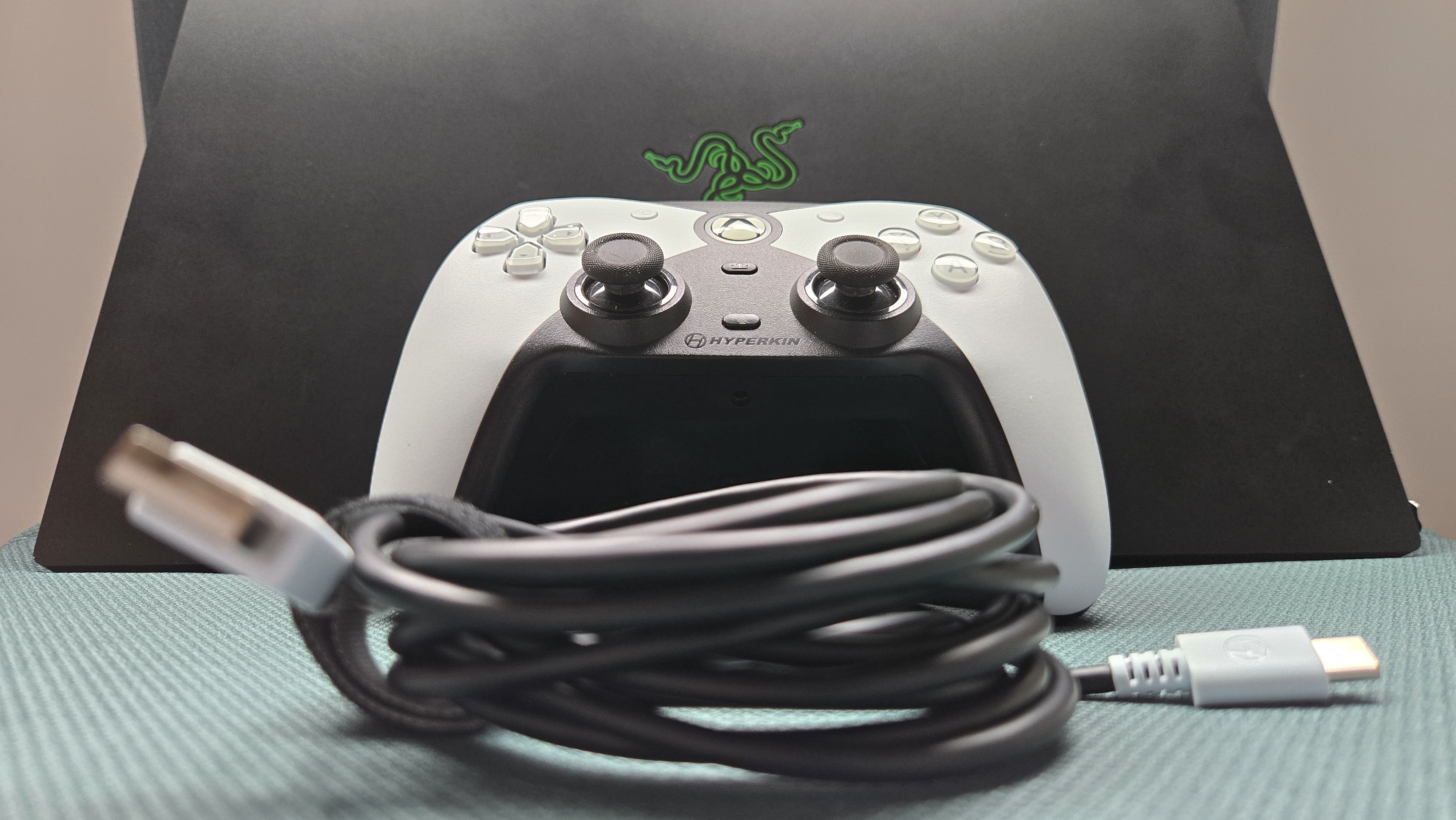 The Hyperkin Competitor on a gaming laptop.