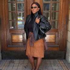 An image of @nnennaechem wearing a funnel neck jacket, one of the biggest autumn jacket trends.