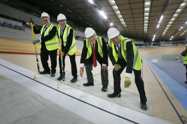 Dignitaries help paint the finish line: John Coates, IOC, Seb Coe LOCOG Chair, Denis Oswald IOC, John Armitt, ODA Chairman