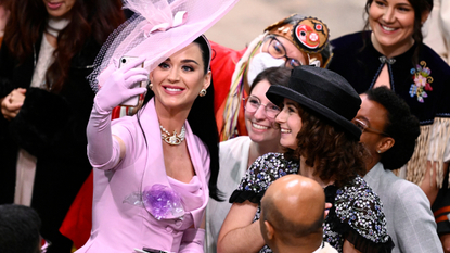 Katy Perry takes selfies with guests during the Coronation of King Charles III and Queen Camilla on May 06, 2023 in London, England. The Coronation of Charles III and his wife, Camilla, as King and Queen of the United Kingdom of Great Britain and Northern Ireland, and the other Commonwealth realms takes place at Westminster Abbey today. Charles acceded to the throne on 8 September 2022, upon the death of his mother, Elizabeth II.