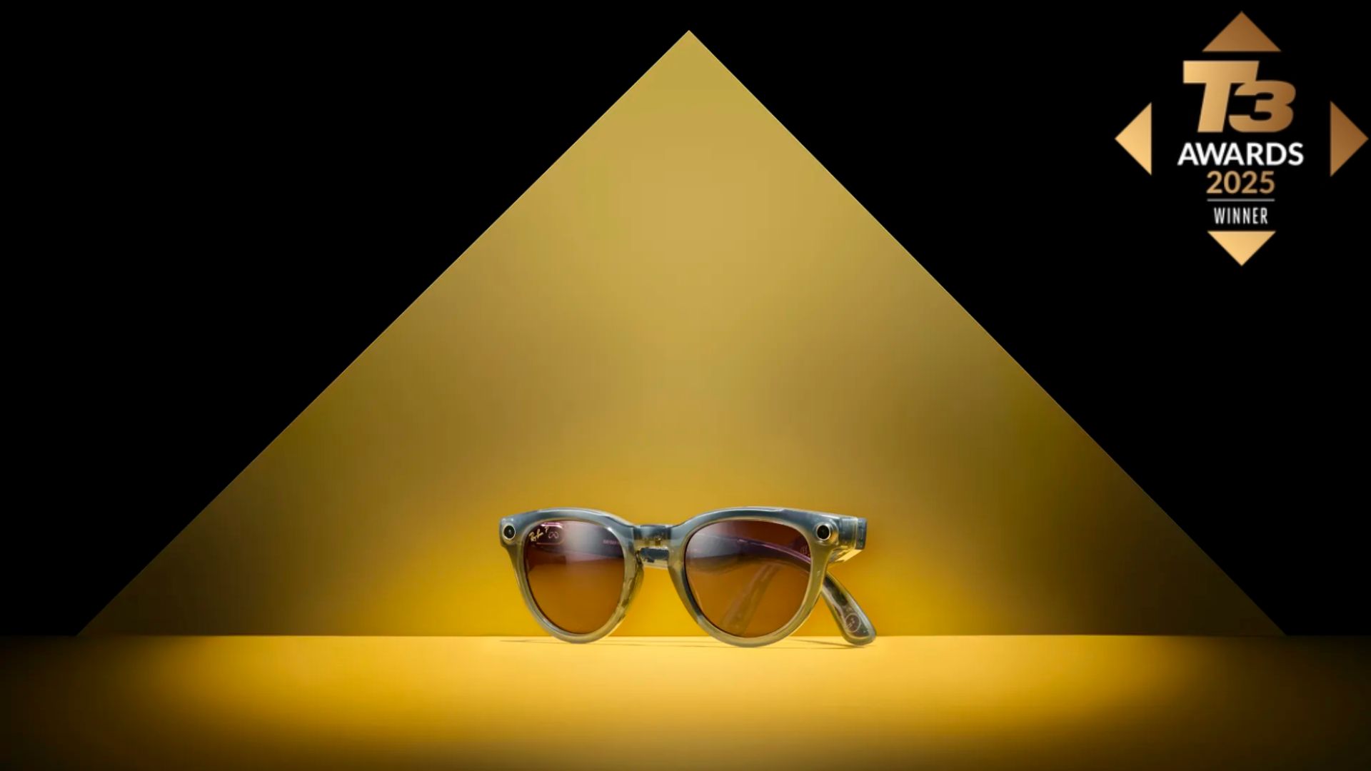 an image of the glasses spot lit in a triangle of yellow light