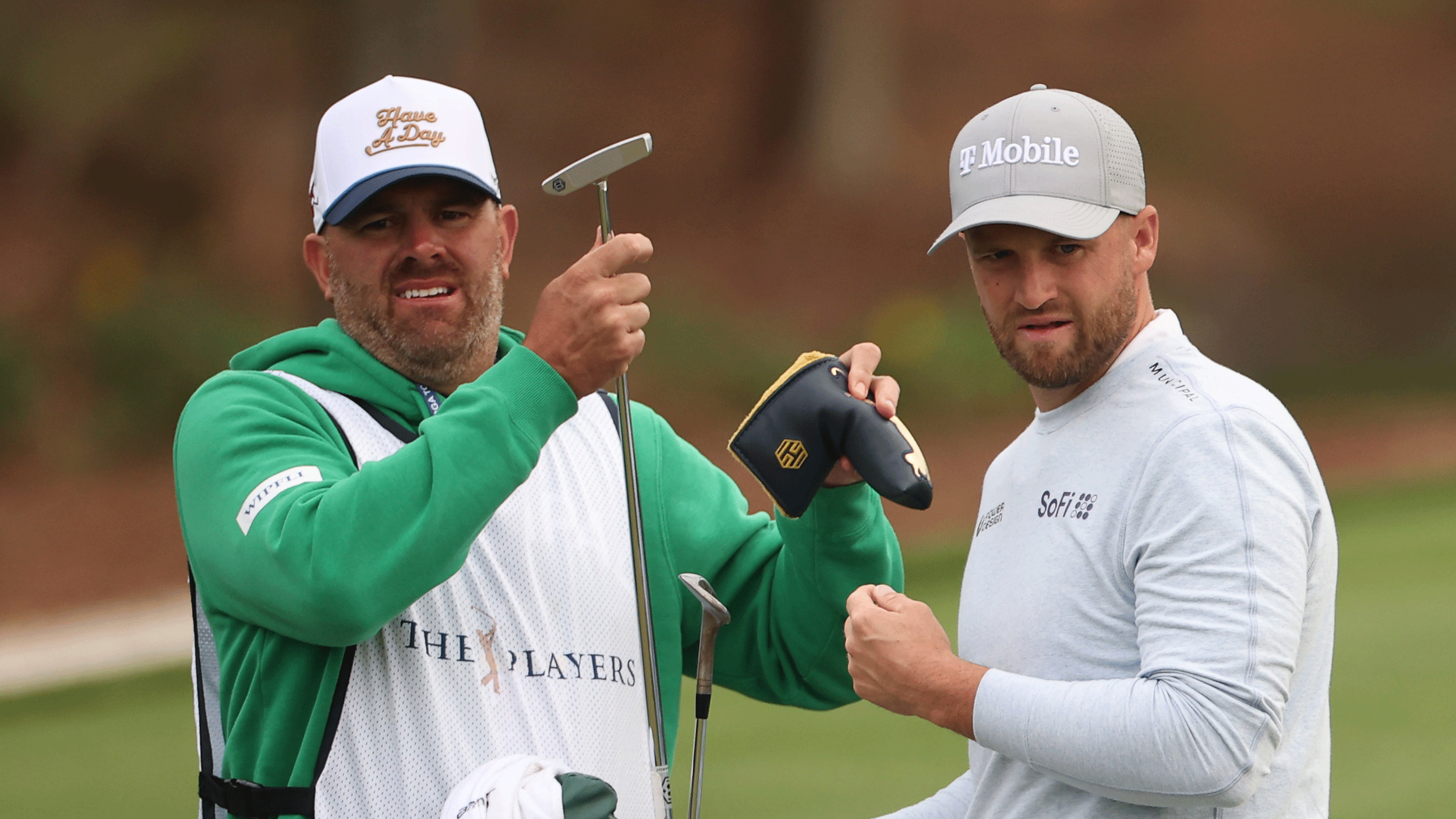 Wyndham Clark (right) and his former caddie John Ellis look on during The Players Championship in 2026
