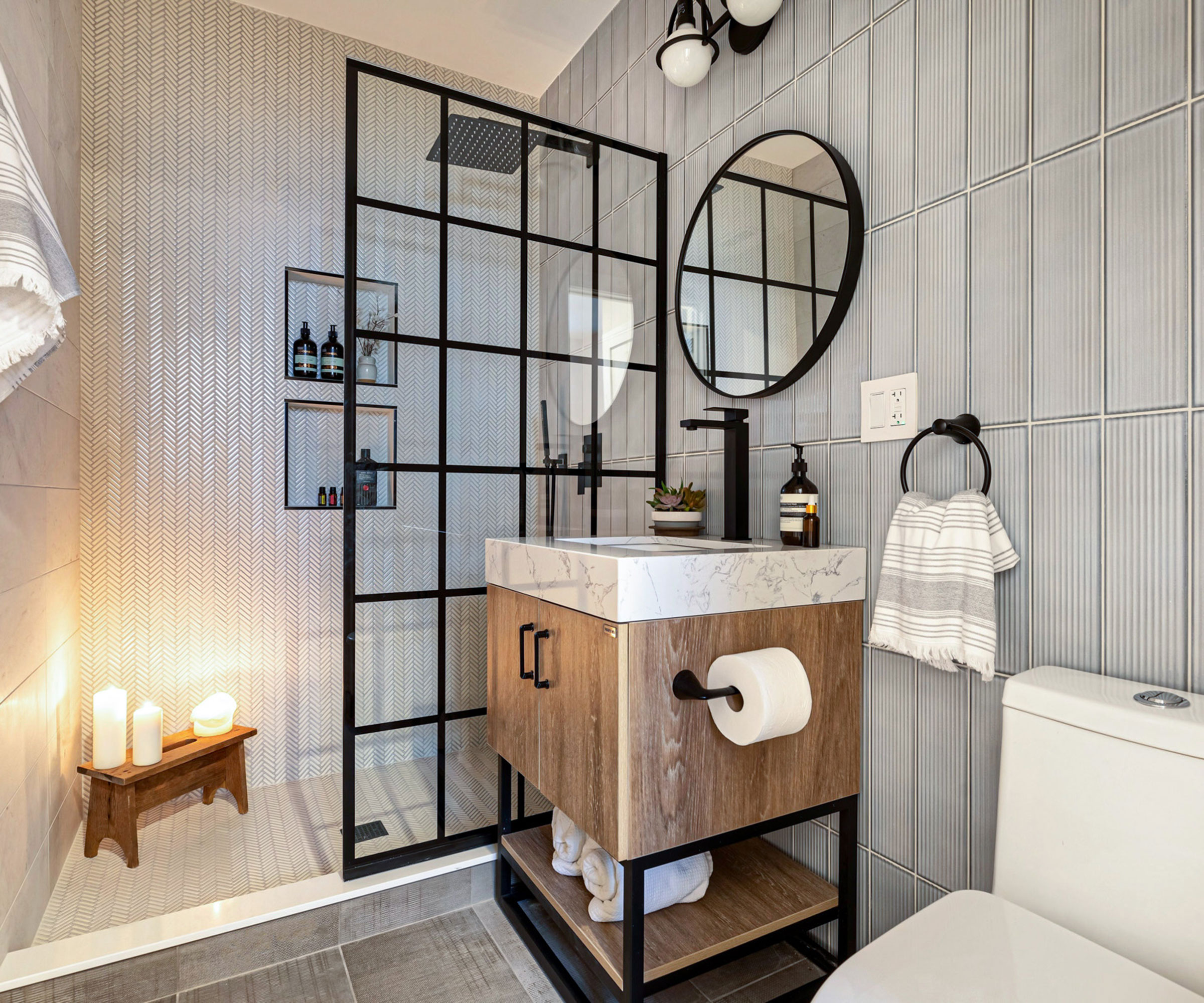 bathroom with black framed glass shower screen and black shower