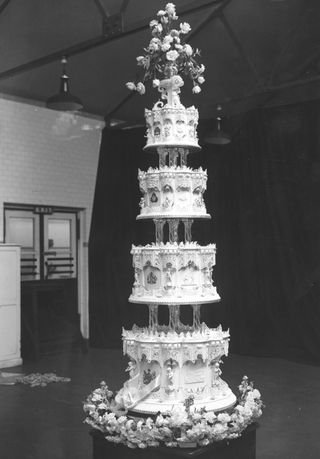 A black and white photo of Princess Elizabeth and Prince Philip's wedding cake